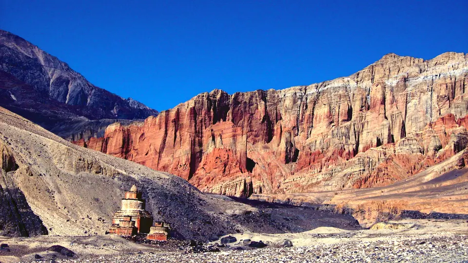 Red cliffs and a chorten in Upper Mustang