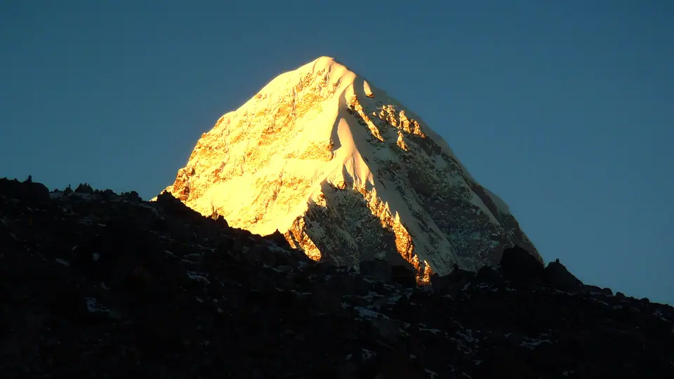 Evening light on a Khumbu peak above the glacier